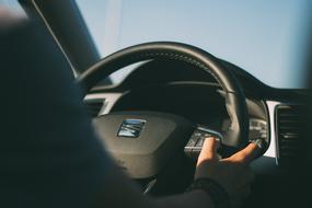 Person in the Seat Leon 2017 car, in light