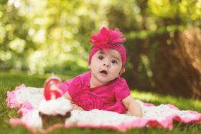 Girl on blanket in park