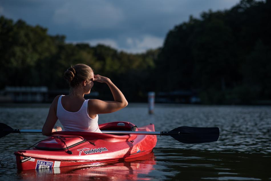 woman in red canoe