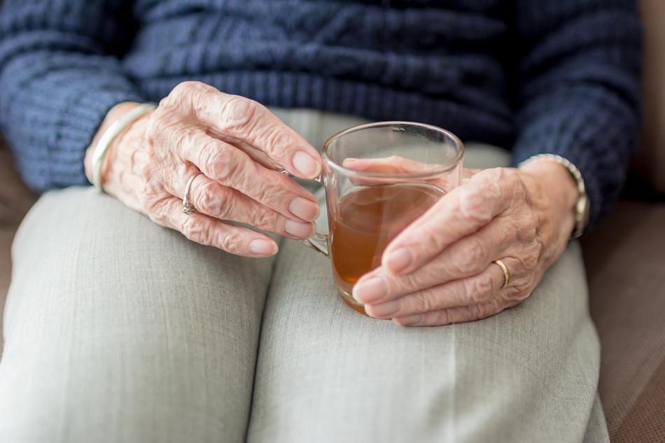 beverage in Hands of Woman