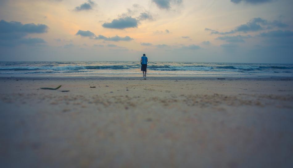 strolling woman on the beach