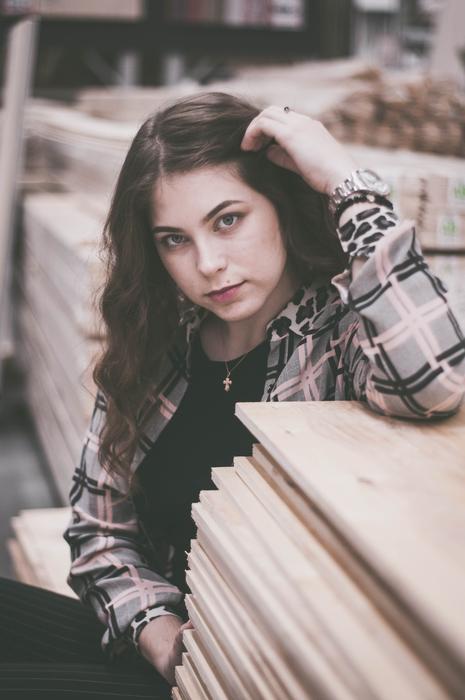 young girl at the sawmill