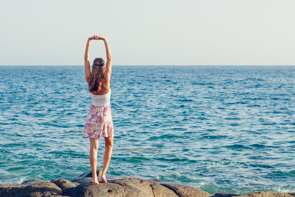 girl standing on stones in the Canary Islands