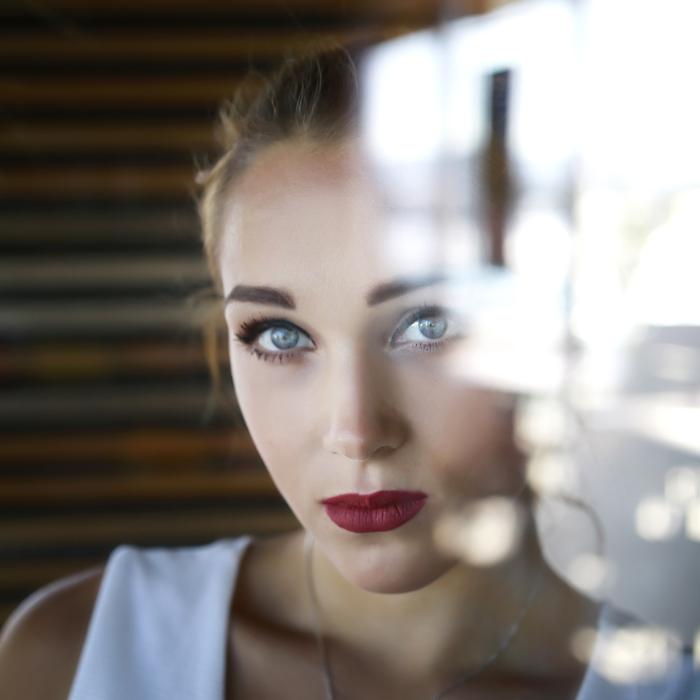 Portrait of the woman with make-up, in lights