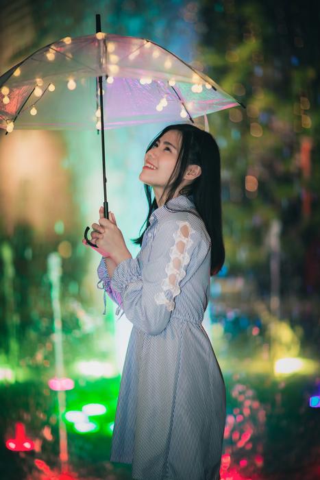Portrait of Girl with umbrella at Night