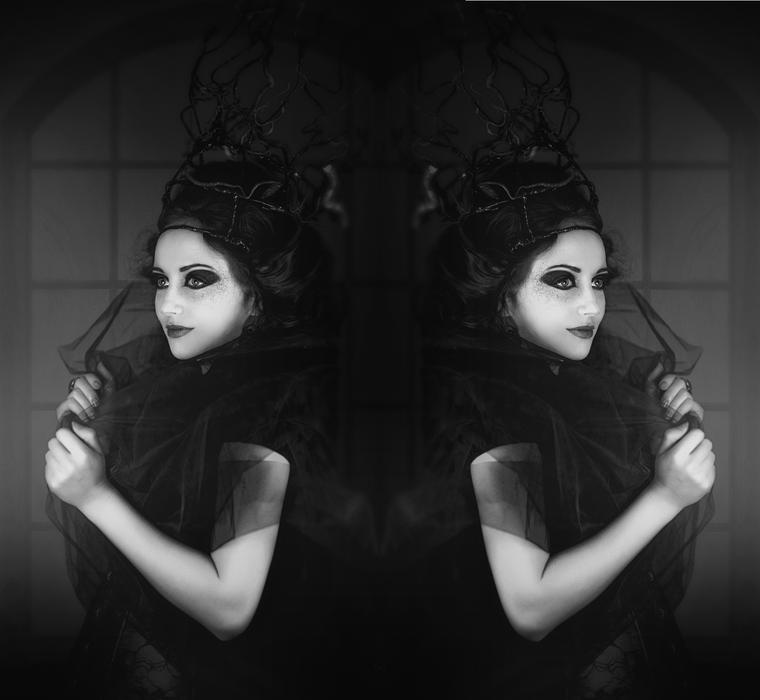 black and white photo of woman mirrored emotions