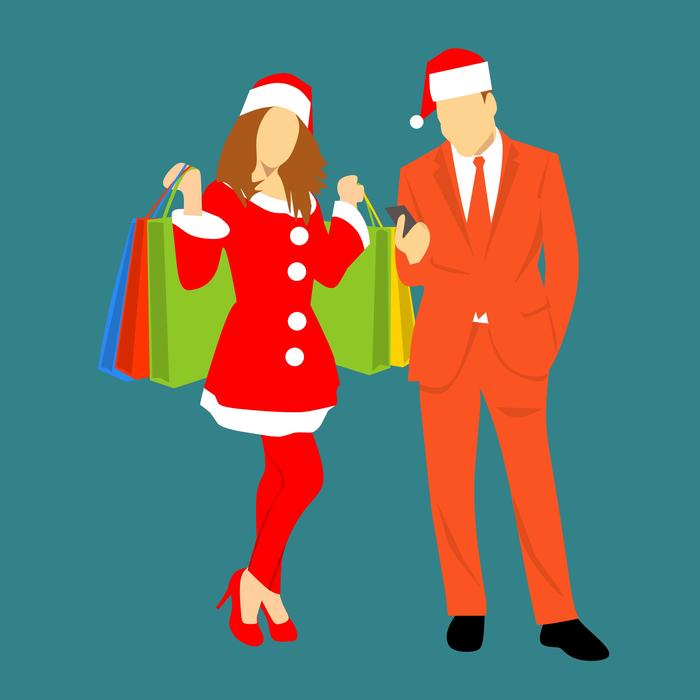 picture of man and woman with shopping for christmas