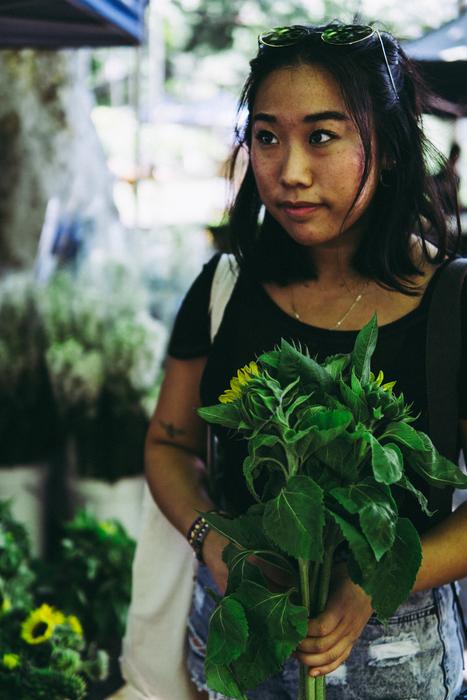 Asian Woman with Flowers