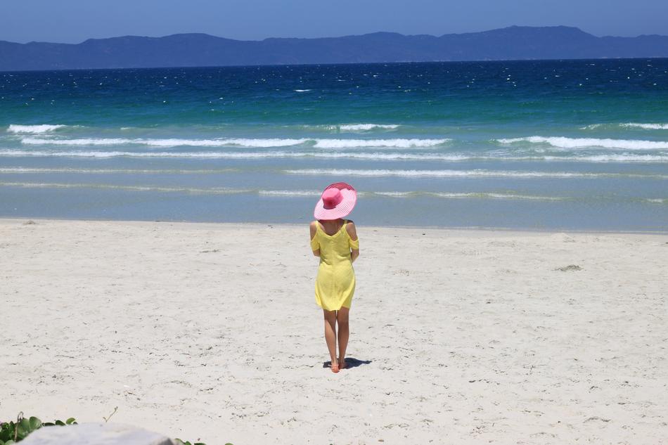 girl in hat at Sea Sand Beach