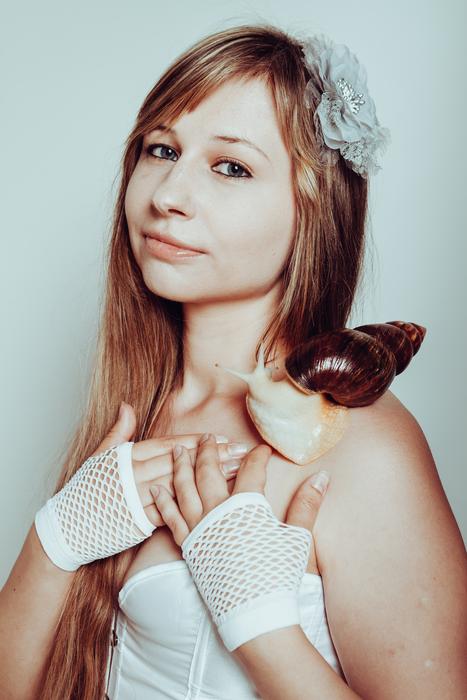 Woman with Snail Gloves
