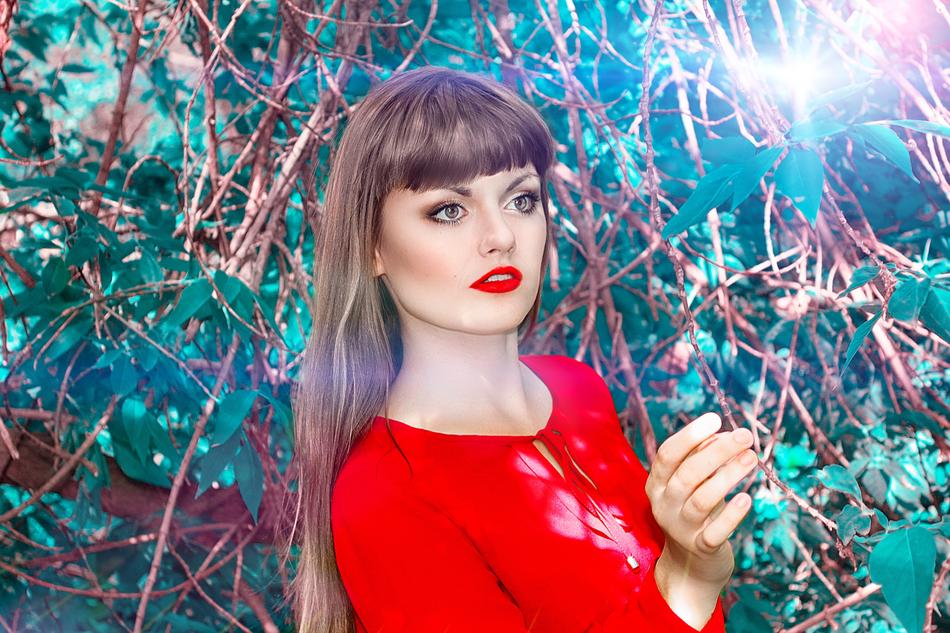 woman in red at a photo shoot