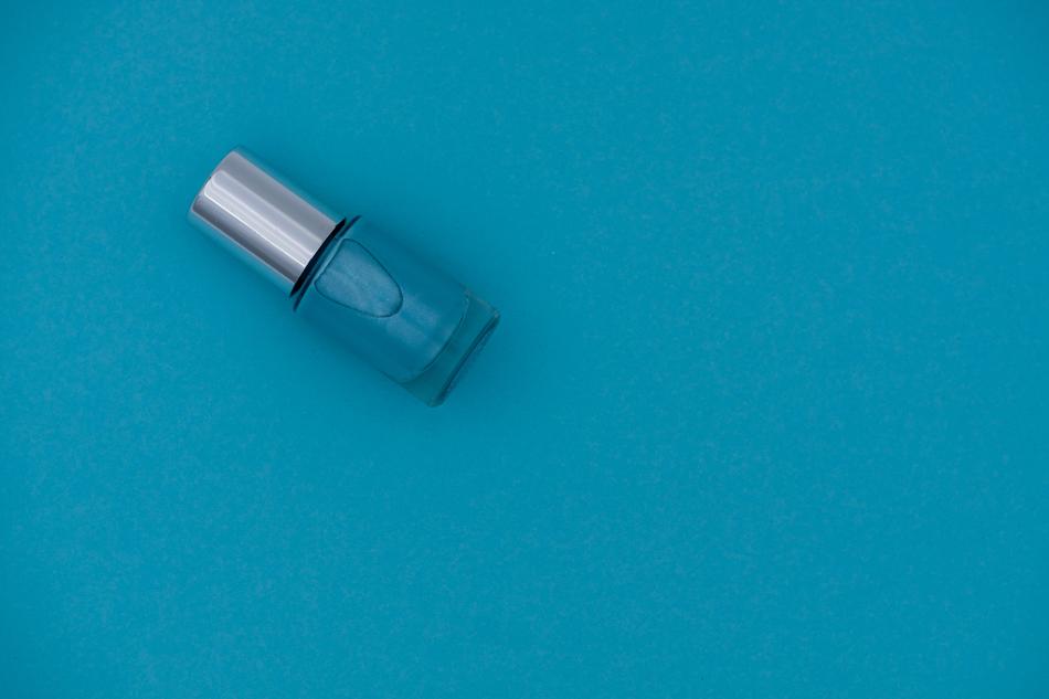 nail polish on blue background
