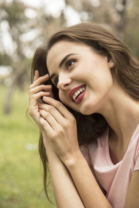 attractive young Woman Smiling, outdoor portrait