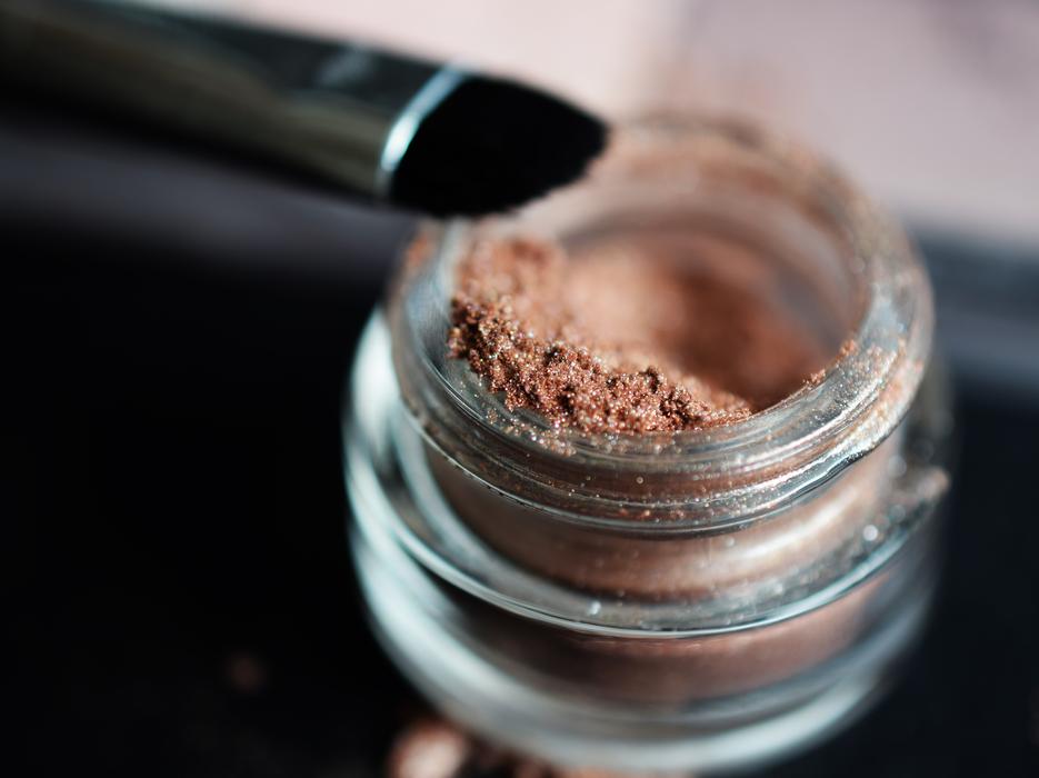 powdery shadows in a jar on a blurred background