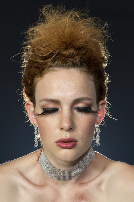 young woman with very long eyelashes