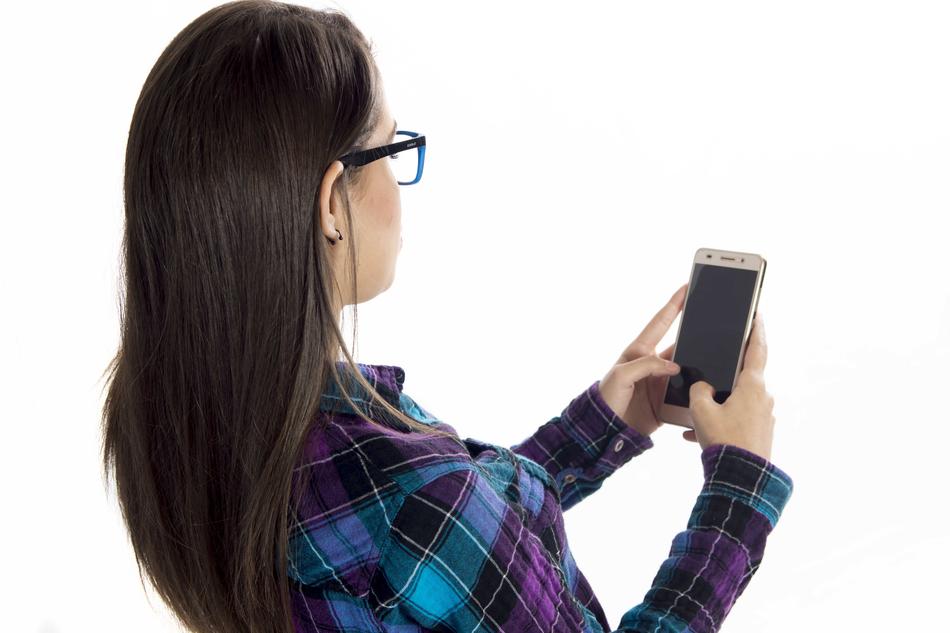 Young Women with phone in hands