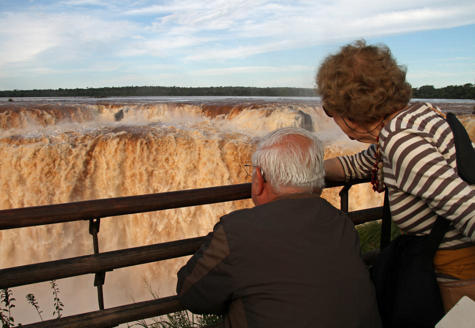 pensioners on the observation deck in front of the waterfall