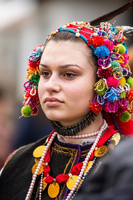 girl in traditional national costume at a festival in Bulgaria