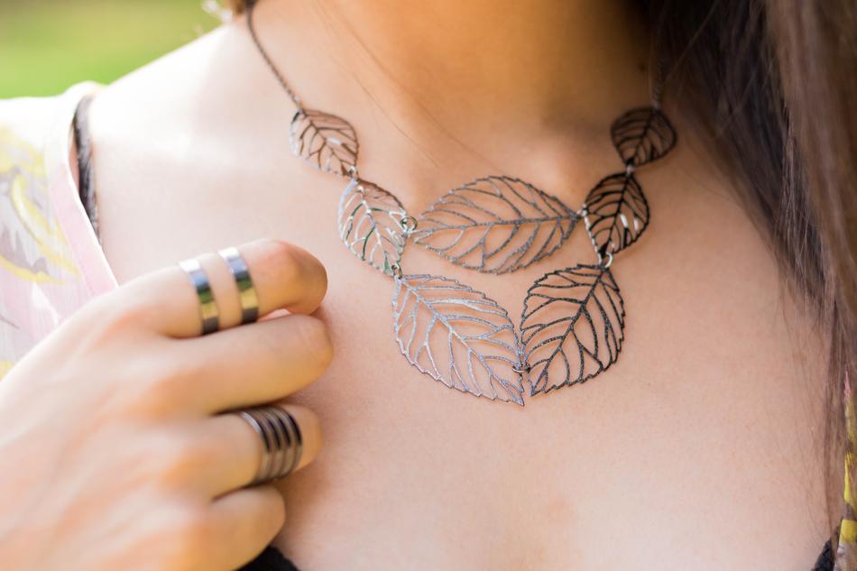 woman in leaf shape necklace