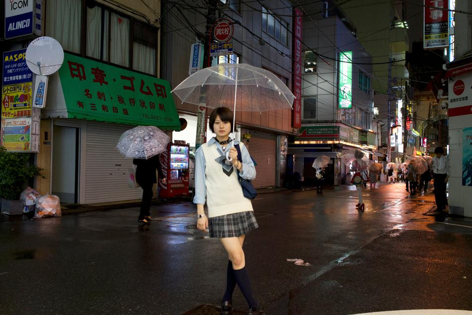 girl with umbrella on Tokyo street