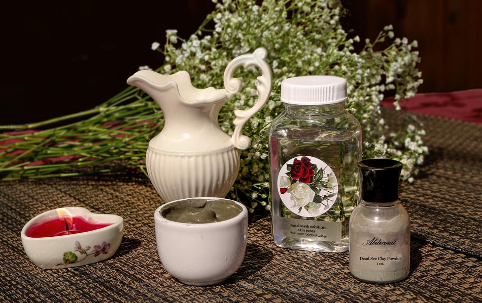 Beautiful and colorful still life with the cosmetics and flowers