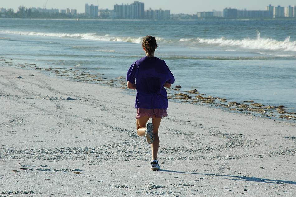 Woman Jogger on Beach