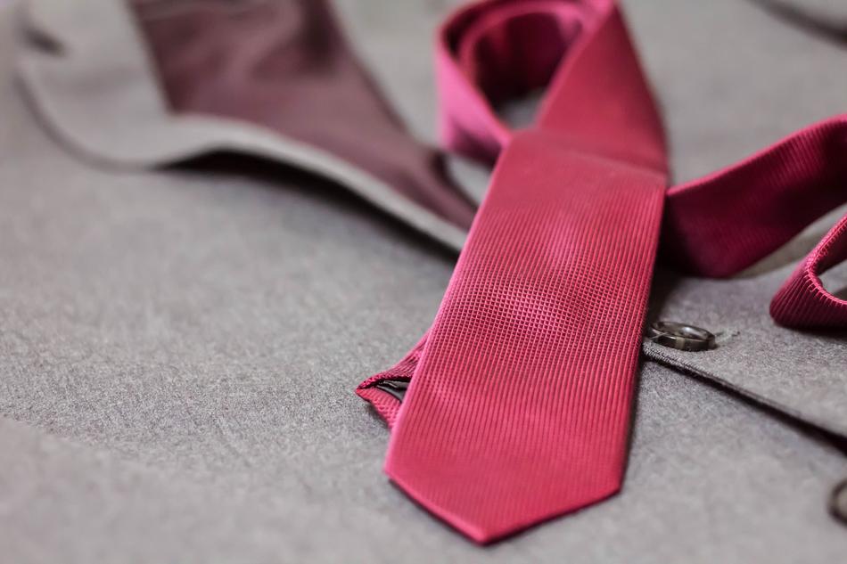 maroon Tie over men’s Suit