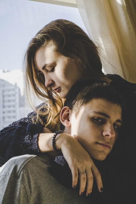 couple in love by the window