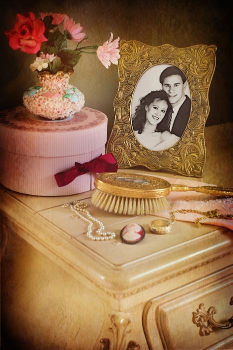 still-life, vintage photo and vintage jewelry on the dresser