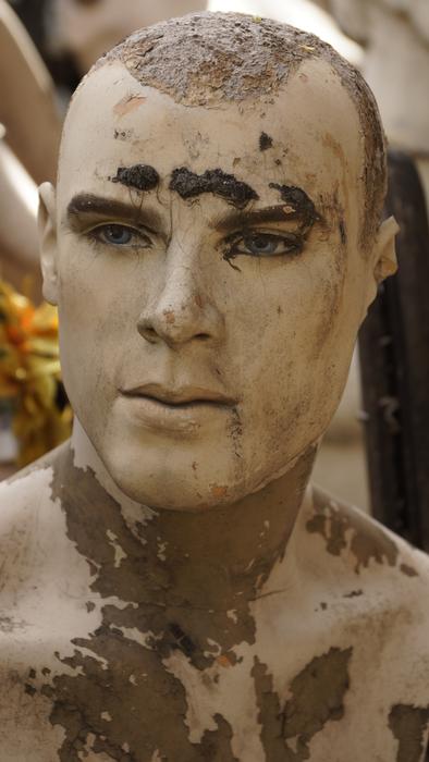 Portrait of the old man mannequin with stains