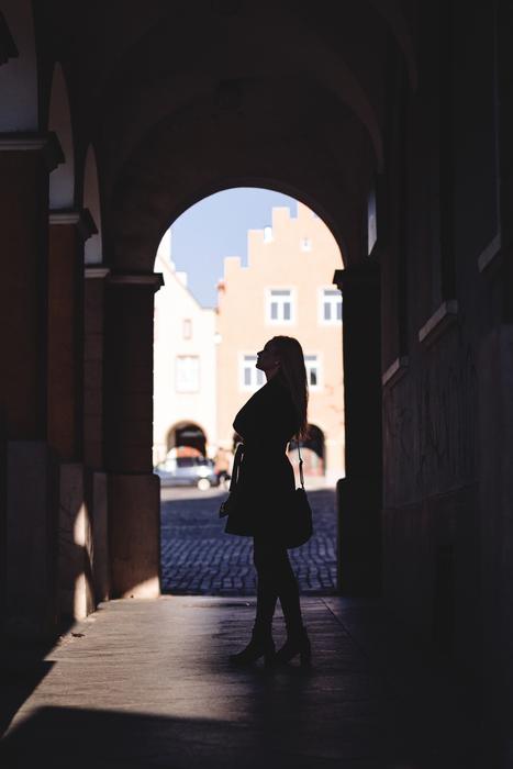 silhouette of a woman in arch