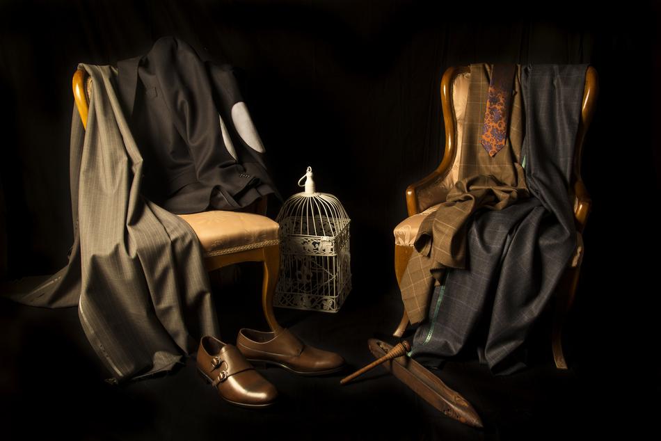 Apparel on the chairs, in light, at black background
