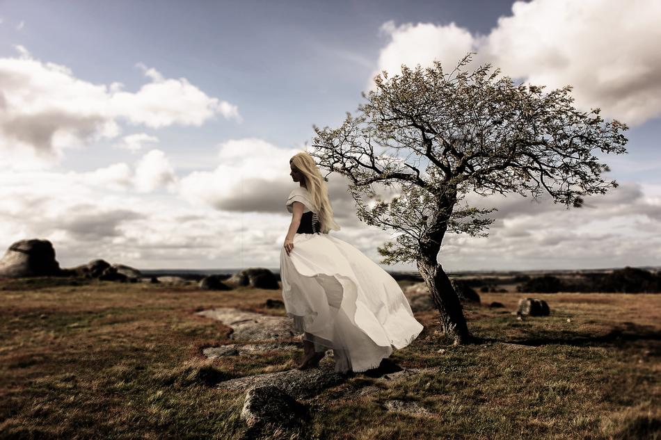photo of a girl in a white dress in the stepp