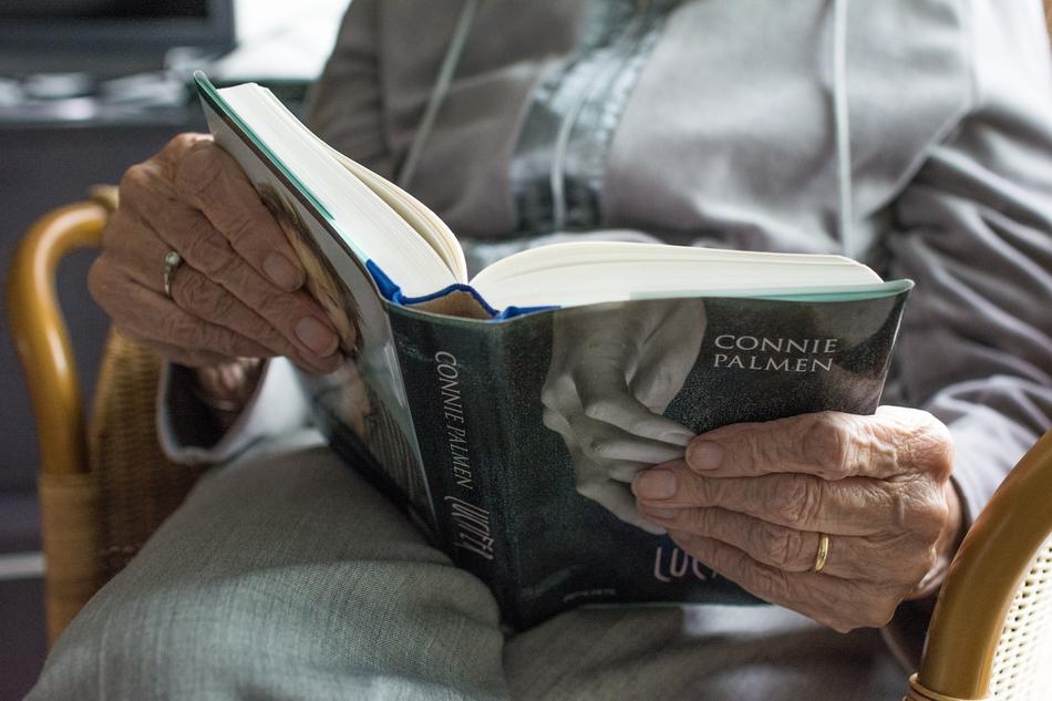 book in Hand Human Woman