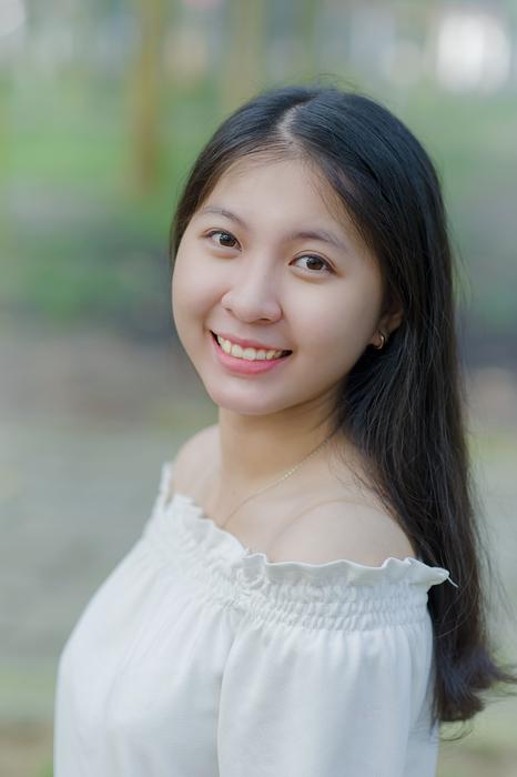 portrait of a beautiful brunette on a blurred background
