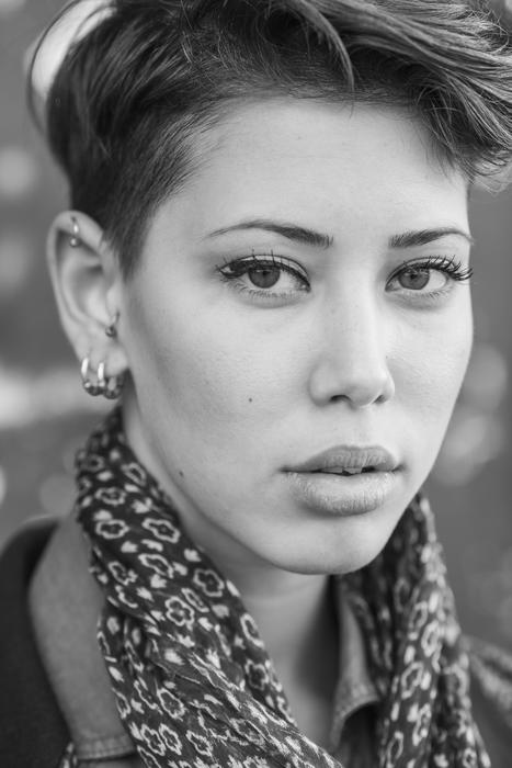 black and white photo of a short-haired girl