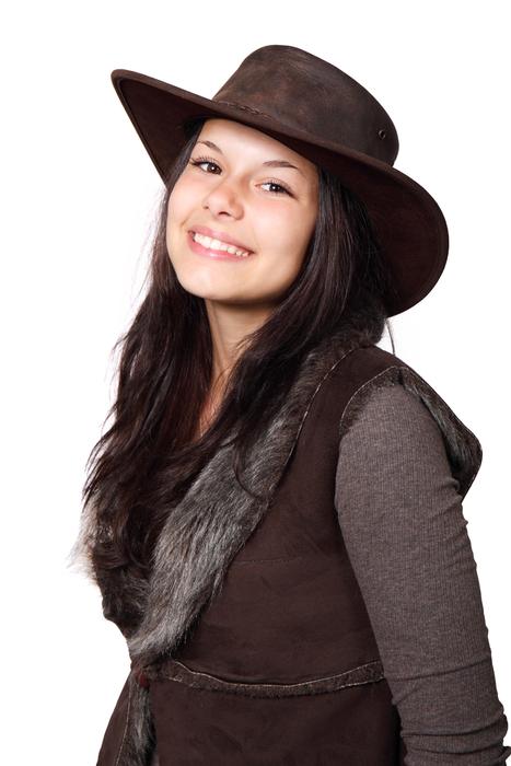 girl in brown leather hat