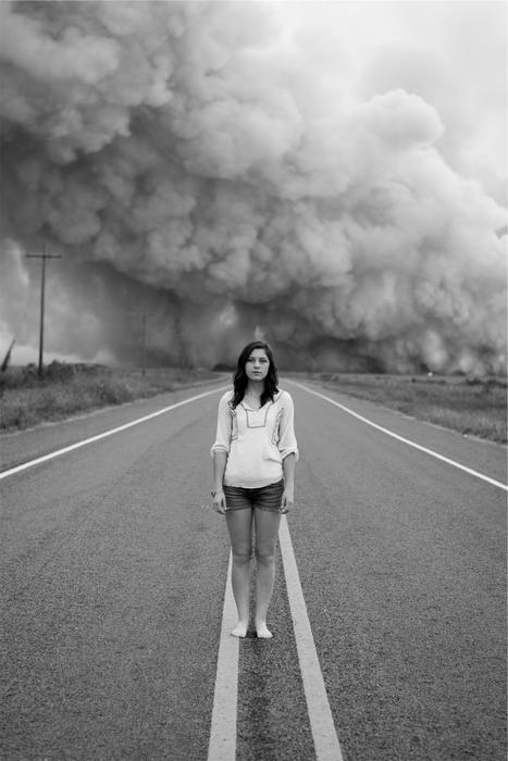 Young Girl on road pavement