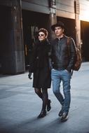 Kiss Couple walking on street