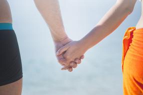 Man Woman Holding Hands