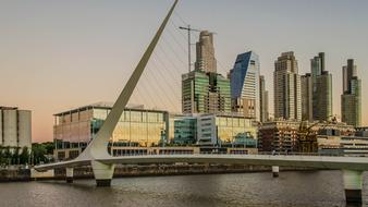 Coast of Puerto Madero with buildings, in Buenos Aires, Argentina, at colorful sunset