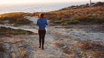 woman Walking on shore