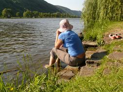 Woman on river Bank
