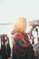 woman in coat at dawn
