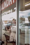 Laundromat Thinking Female