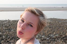 Portrait of funny Girl on Beach