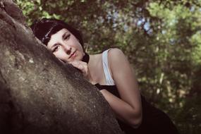 photo of Fashion Girl relax in forest