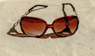 Fashion Sunglasses on sand