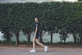 Woman Walking in park