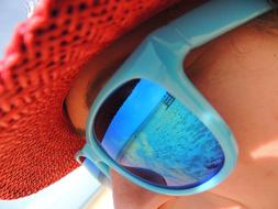 blue Sunglasses at Woman face